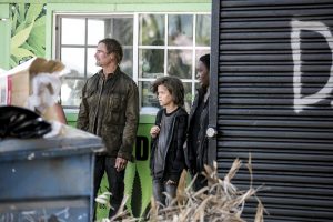 COLONY -- "Sublimation" Episode 203 -- Pictured: (l-r) Josh Holloway as Will Bowman, Jacob Buster as Charlie Bowman, Carolyn Michelle Smith as Devon -- (Photo by: Isabella Vosmikova/USA Network)