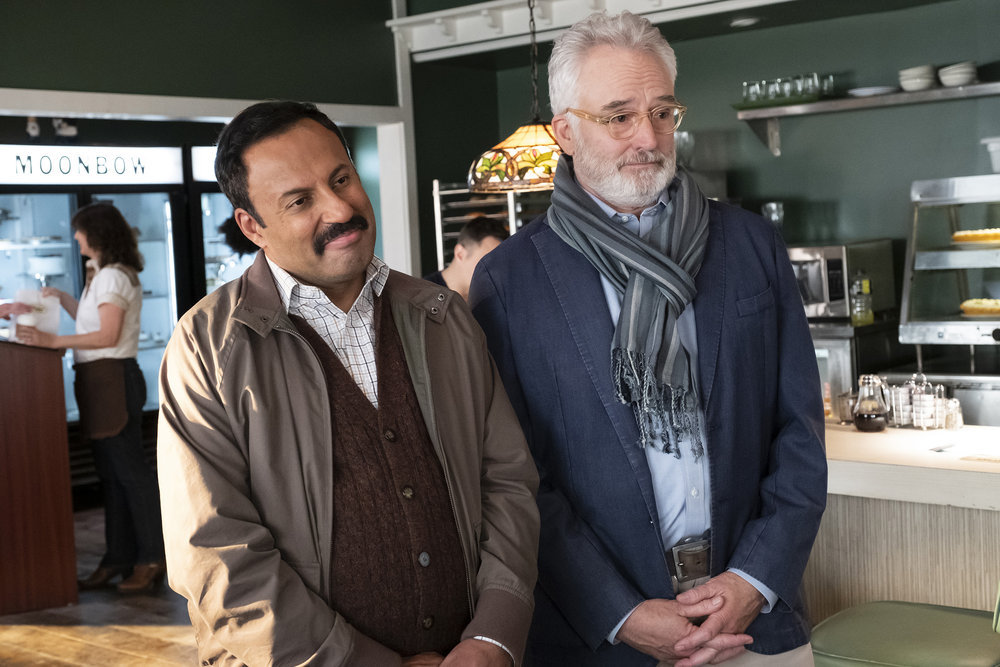 PERFECT HARMONY -- "Any Given Monday" Episode 108 -- Pictured: (l-r) Rizwan Manji as Reverand Jax, Bradley Whitford as Arthur -- (Photo by: Justin Lubin/NBC)