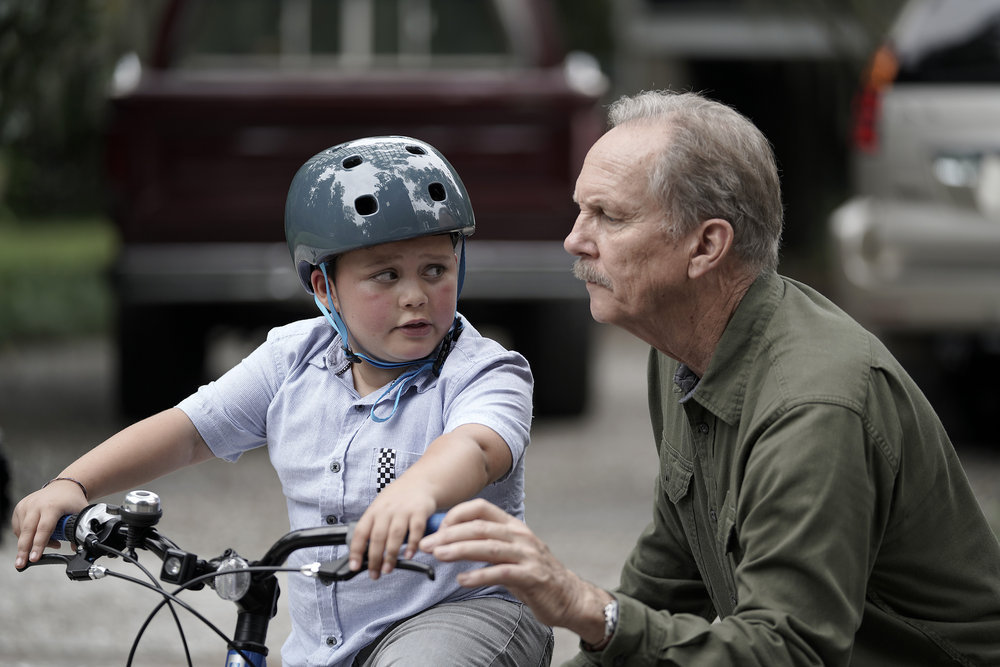 COUNCIL OF DADS -- "I'm Not Fine" Episode 102 -- Pictured: (l-r) Blue Chapman as JJ Perry, Michael O'Neil as Larry Mills -- (Photo by: Seth F. Johnson/NBC)