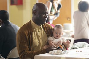 COUNCIL OF DADS -- "The Best Laid Plans" Episode 107 -- Pictured: (l-r) Kevin Daniels as Peter Richards, Baby Hope -- (Photo by: Seth F. Johnson/NBC)