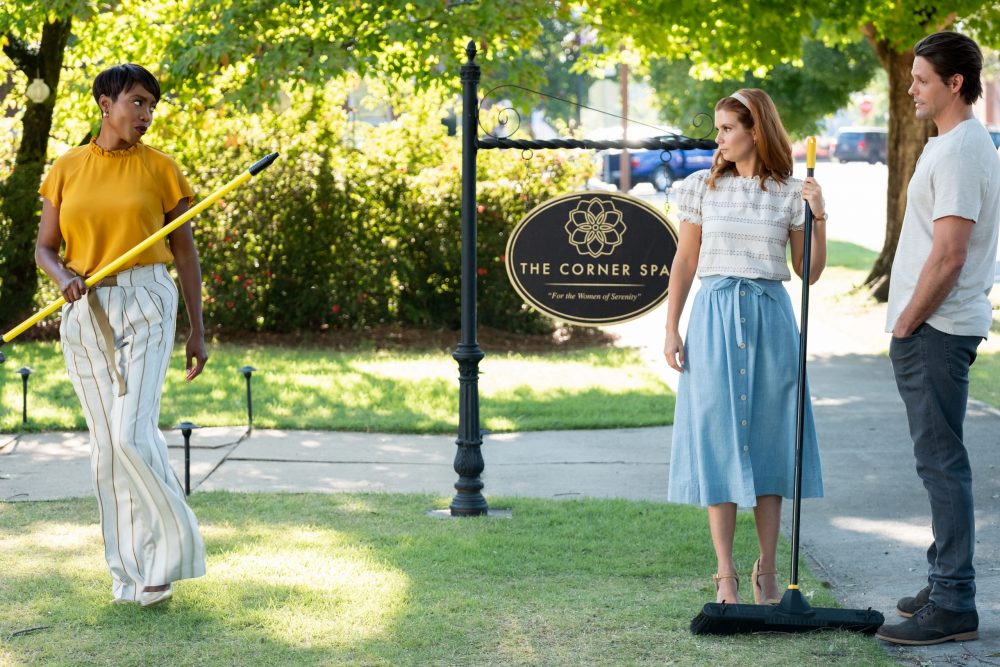 SWEET MAGNOLIAS (L TO R) HEATHER HEADLEY as HELEN DECATUR, JOANNA GARCIA SWISHER as MADDIE TOWNSEND, and JUSTIN BRUENING as CAL MADDOX in episode 105 of SWEET MAGNOLIAS Cr. ELIZA MORSE/NETFLIX © 2020