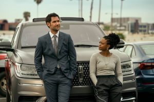 The Lincoln Lawyer. (L to R) Manuel Garcia-Rulfo as Mickey Haller, Jazz Raycole as Izzy in episode 102 of The Lincoln Lawyer. Cr. Lara Solanki/Netflix © 2022