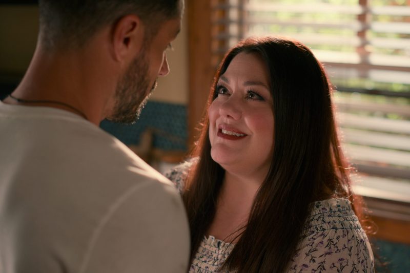 Sweet Magnolias character Dana Sue looking into husband Ronnie's eyes Cr. Courtesy of Netflix © 2023